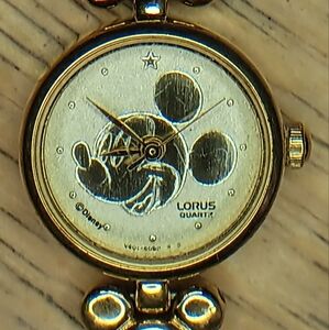 X Lorus Mickey Mouse gold tone case, bracelet and, profile on the dial 3 hand